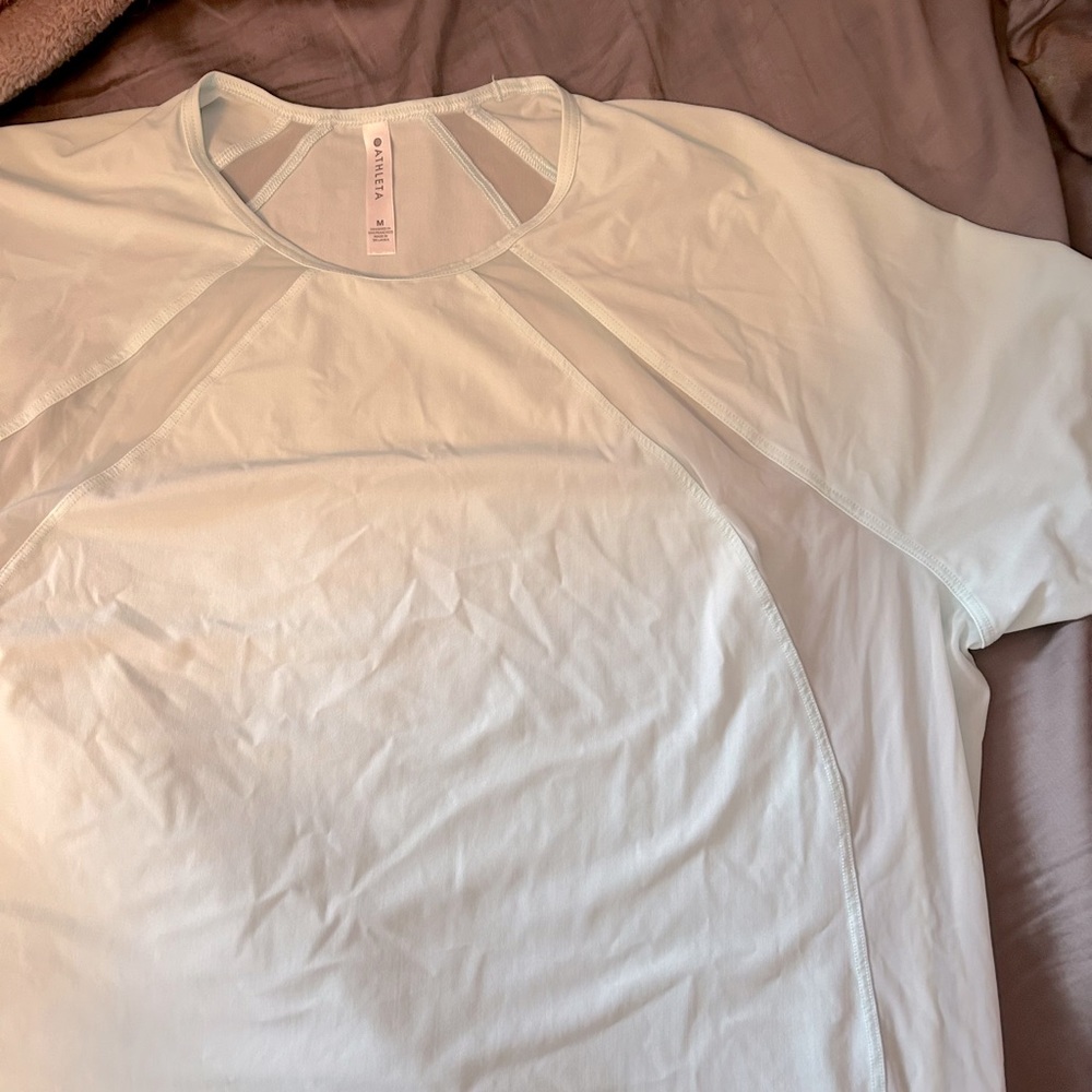 Light blue women’s Athleta size medium workout top